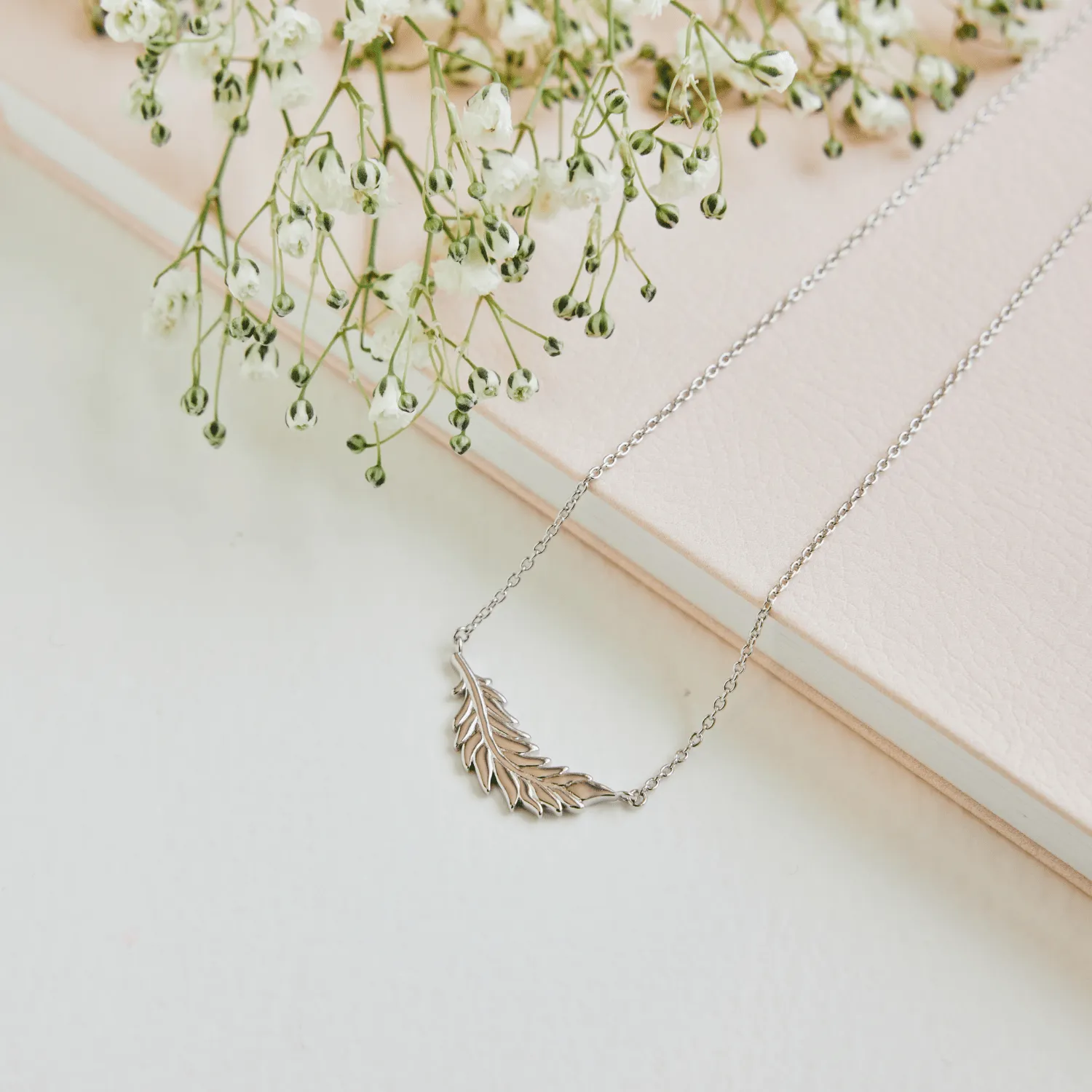 Floating Flamingo Feather Necklace by Lindsey Gurk