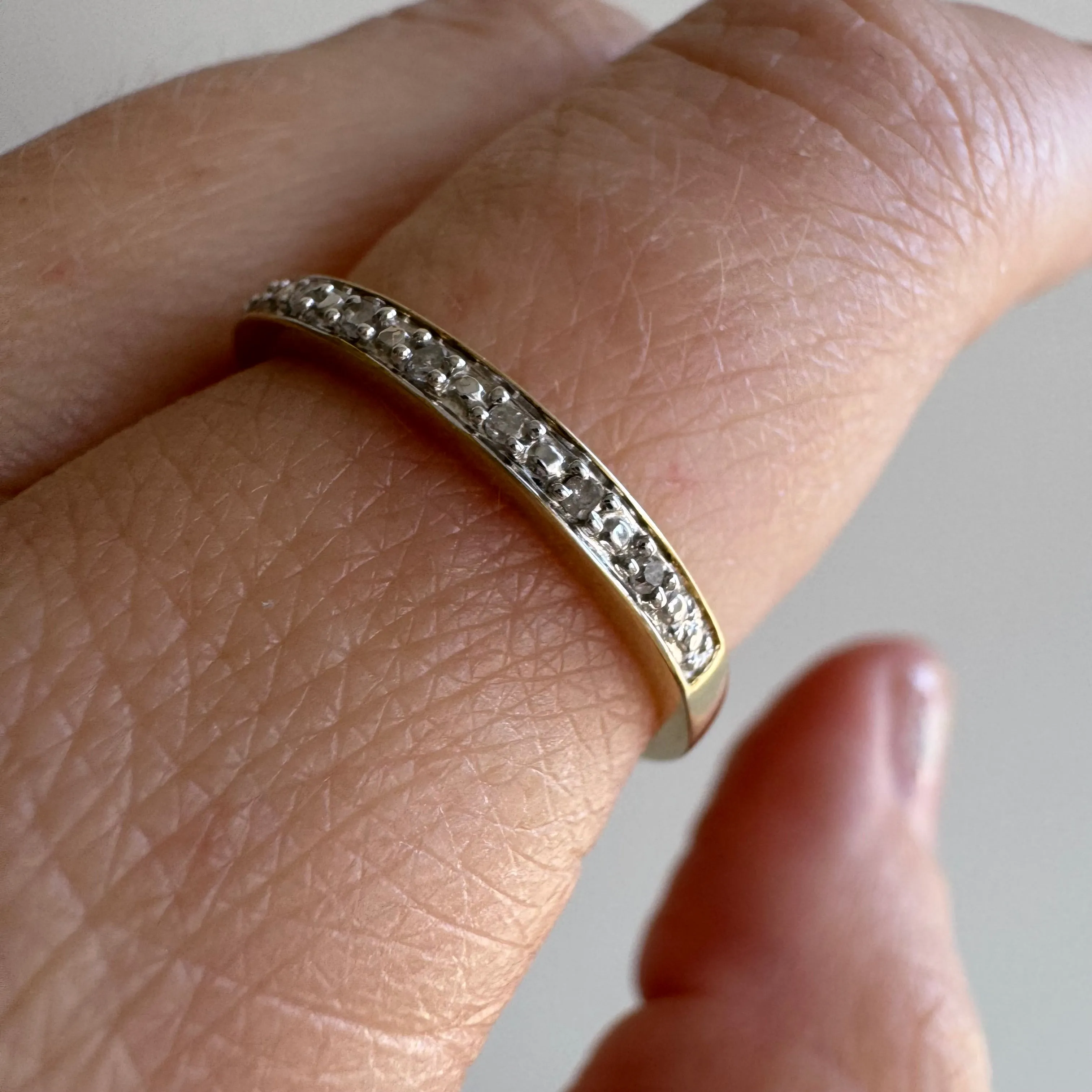 P R E - L O V E D // extra sparkle / 10k yellow and white gold half eternity diamond band / size 7