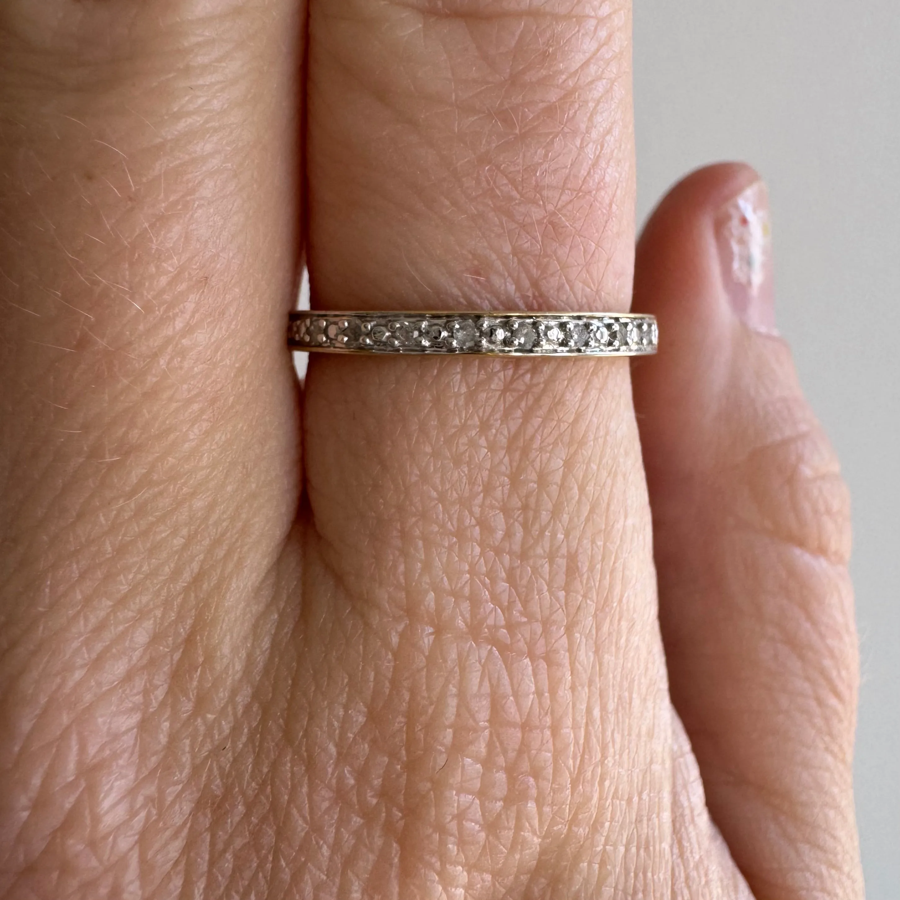 P R E - L O V E D // extra sparkle / 10k yellow and white gold half eternity diamond band / size 7